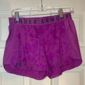 Under Armour bright pink workout shorts.
